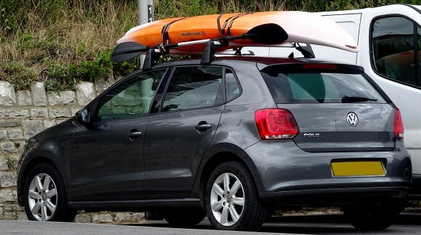 Strapping Kayaks On A top of the car