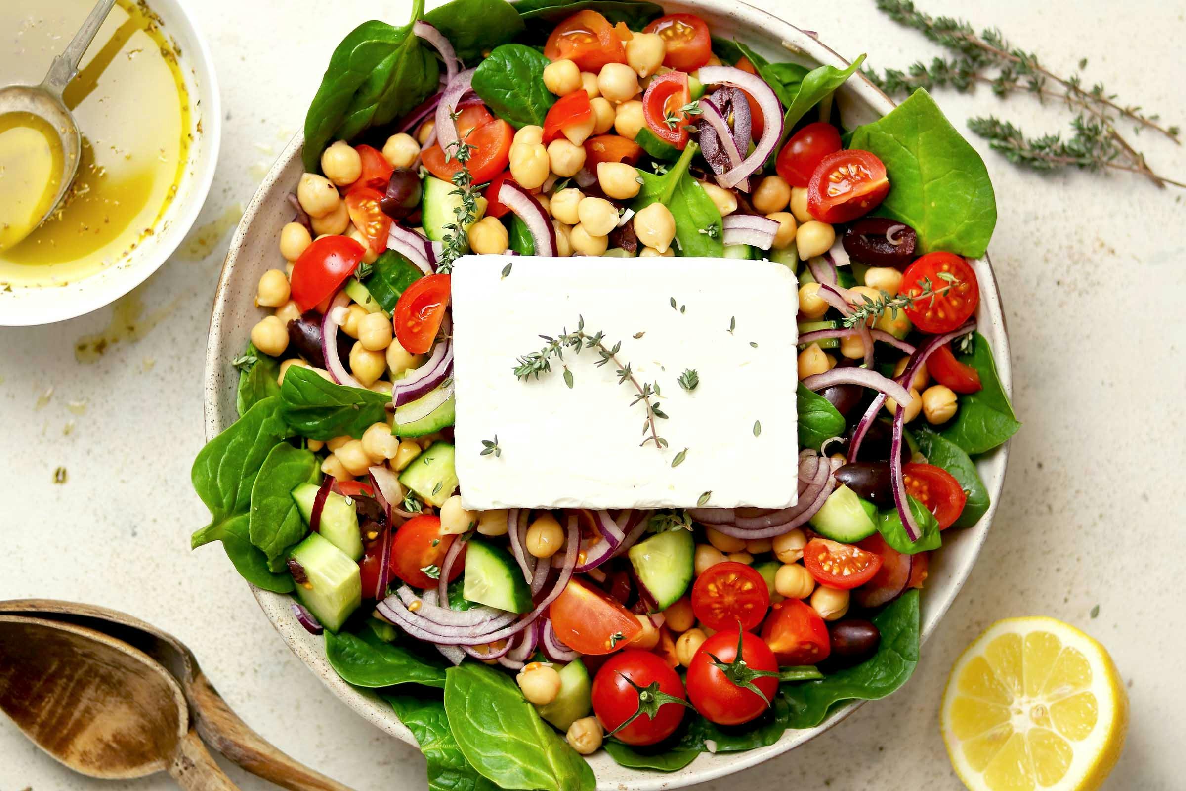 A spinach, mozzarella, tomato, and chickpea salad 