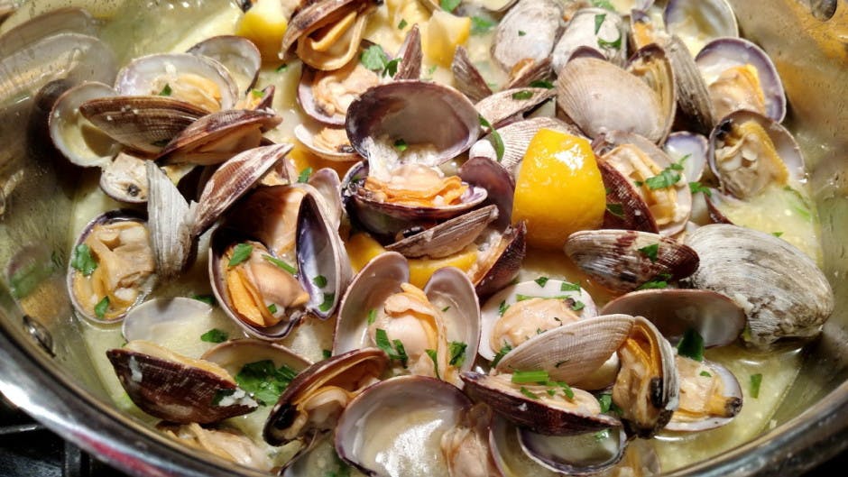 Clams Steamed In A Broth Made With White Wine