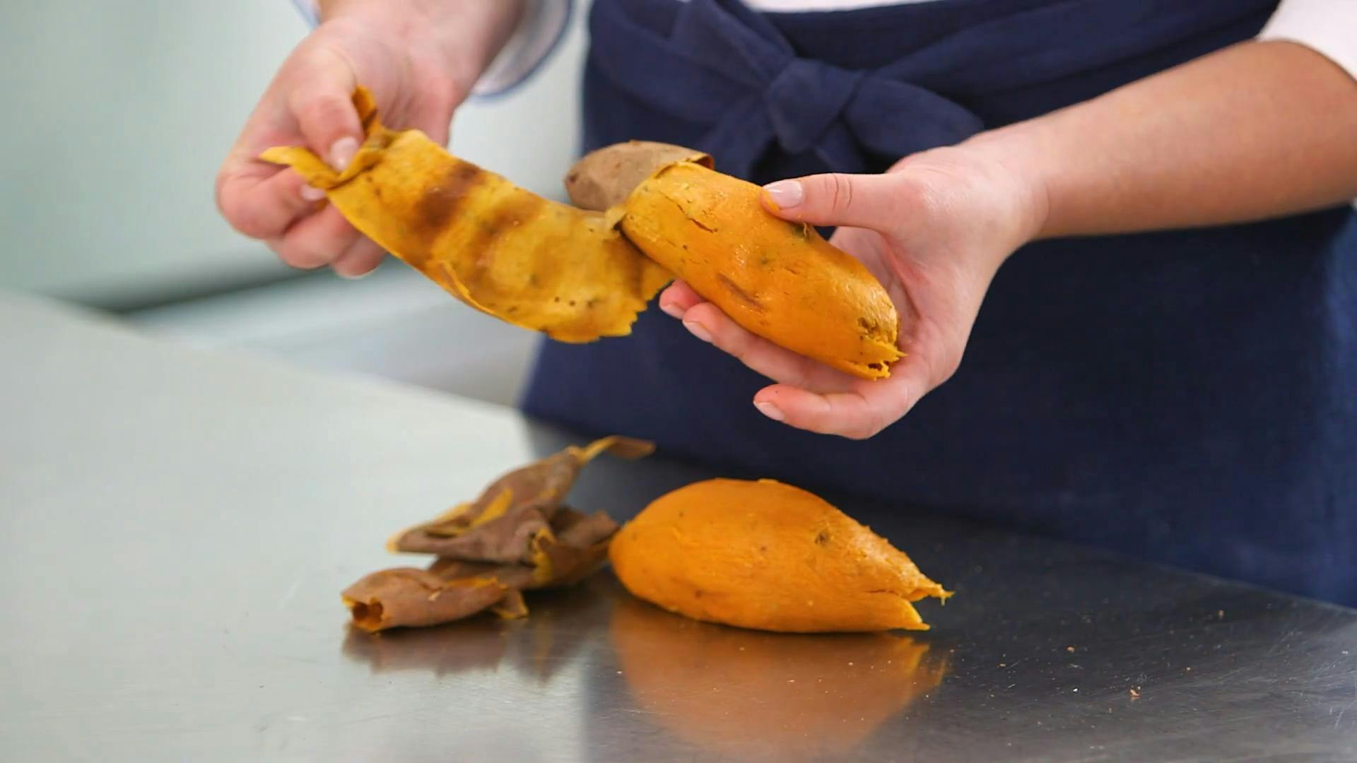 peeling roasted sweet potatoes
